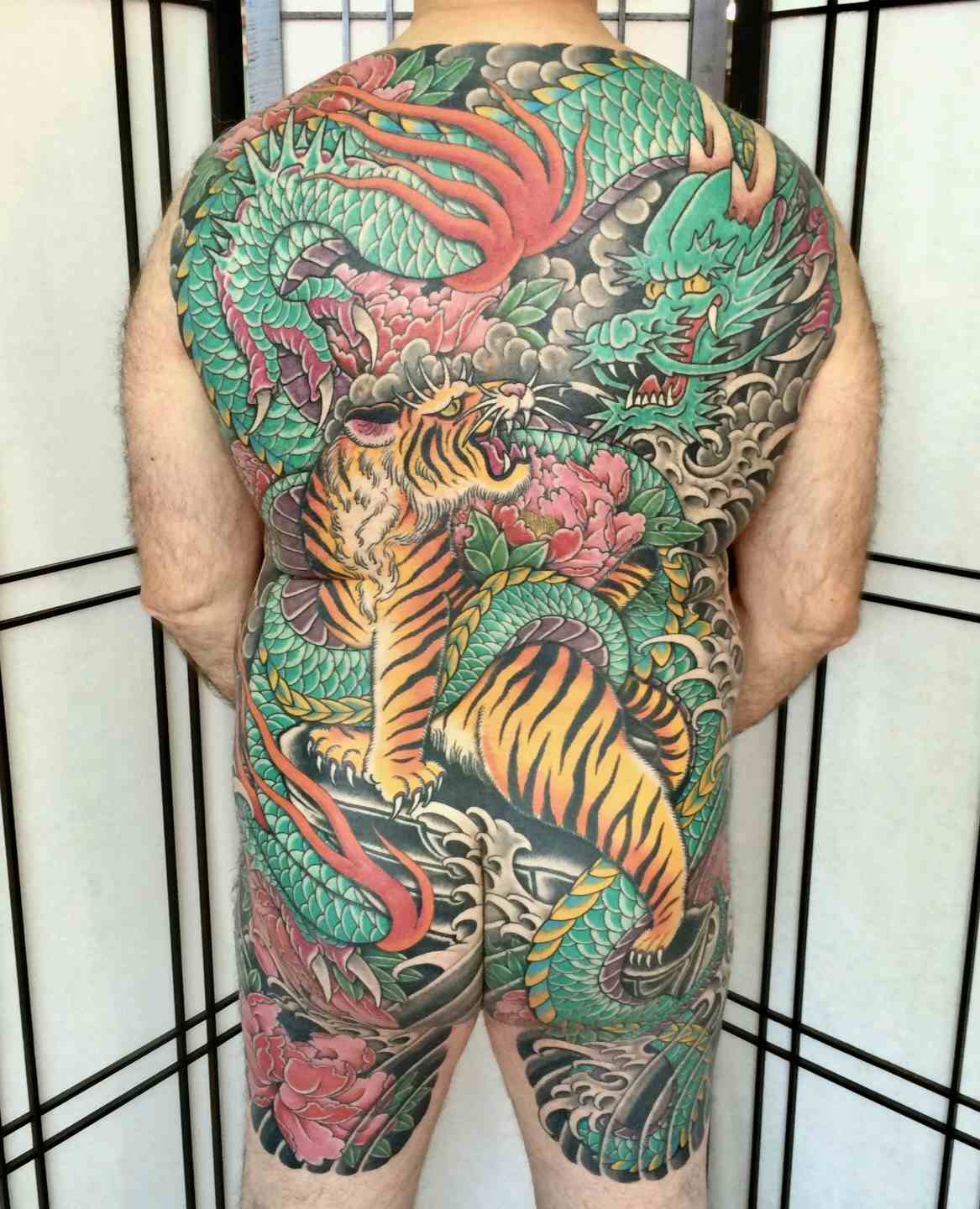 Dragon tiger backpiece tattoo