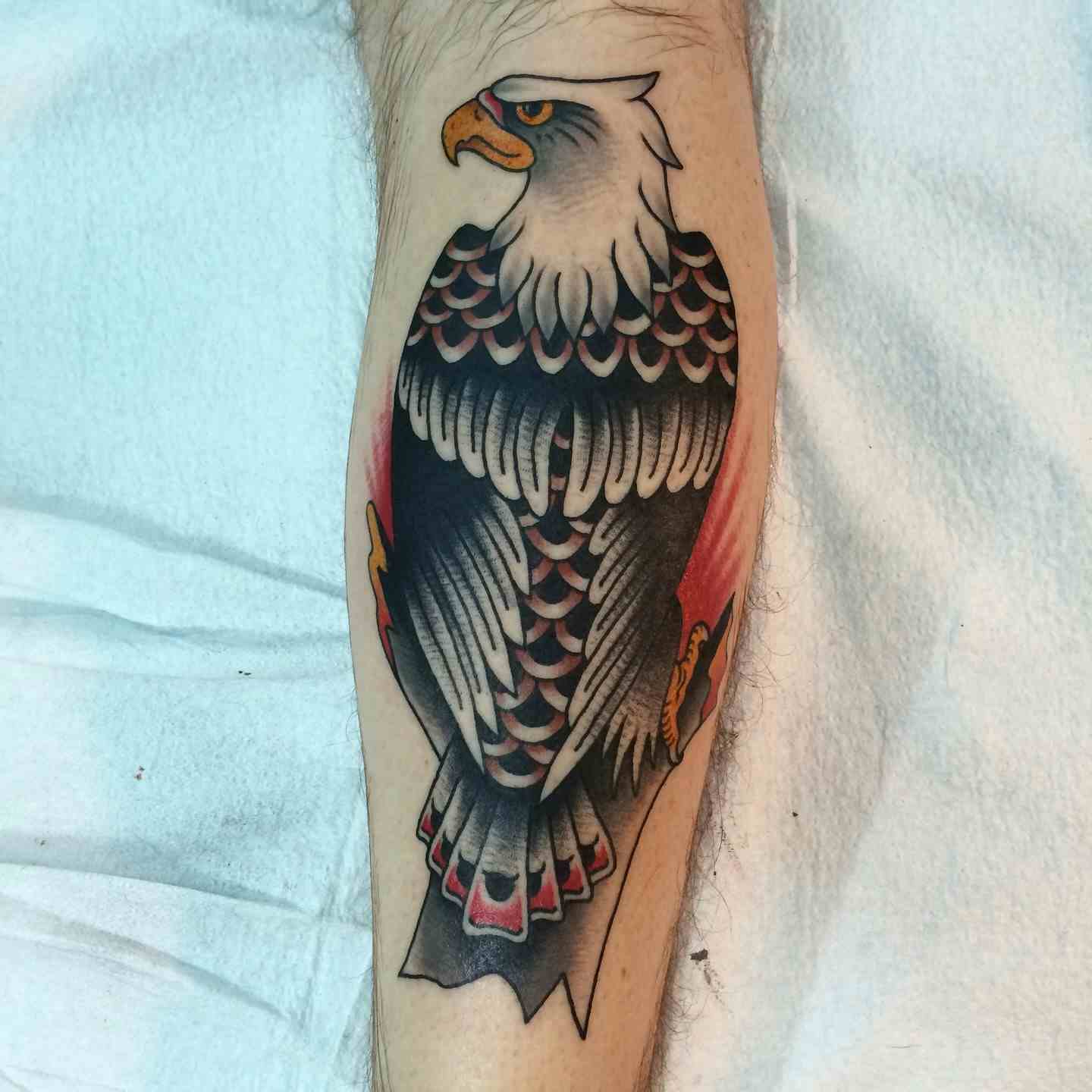 Perched eagle tattoo