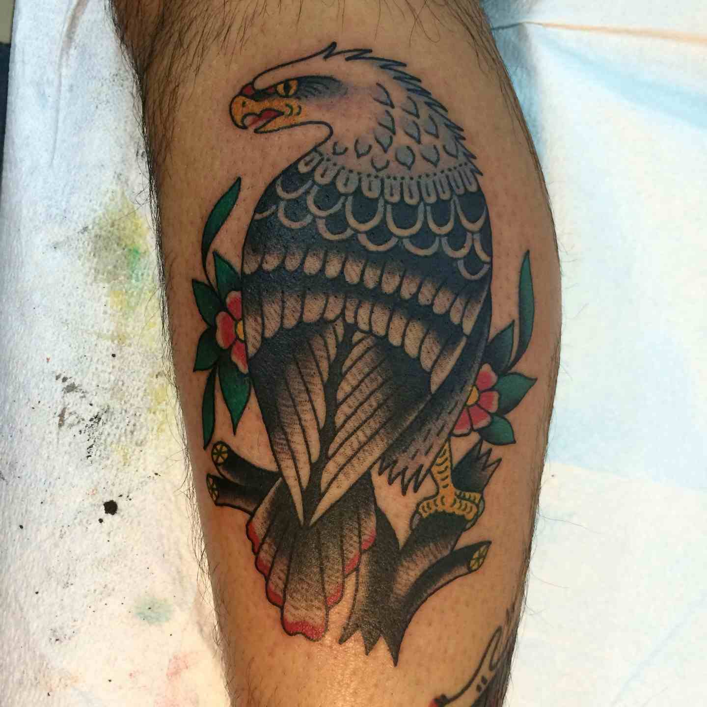 Eagle on a branch tattoo
