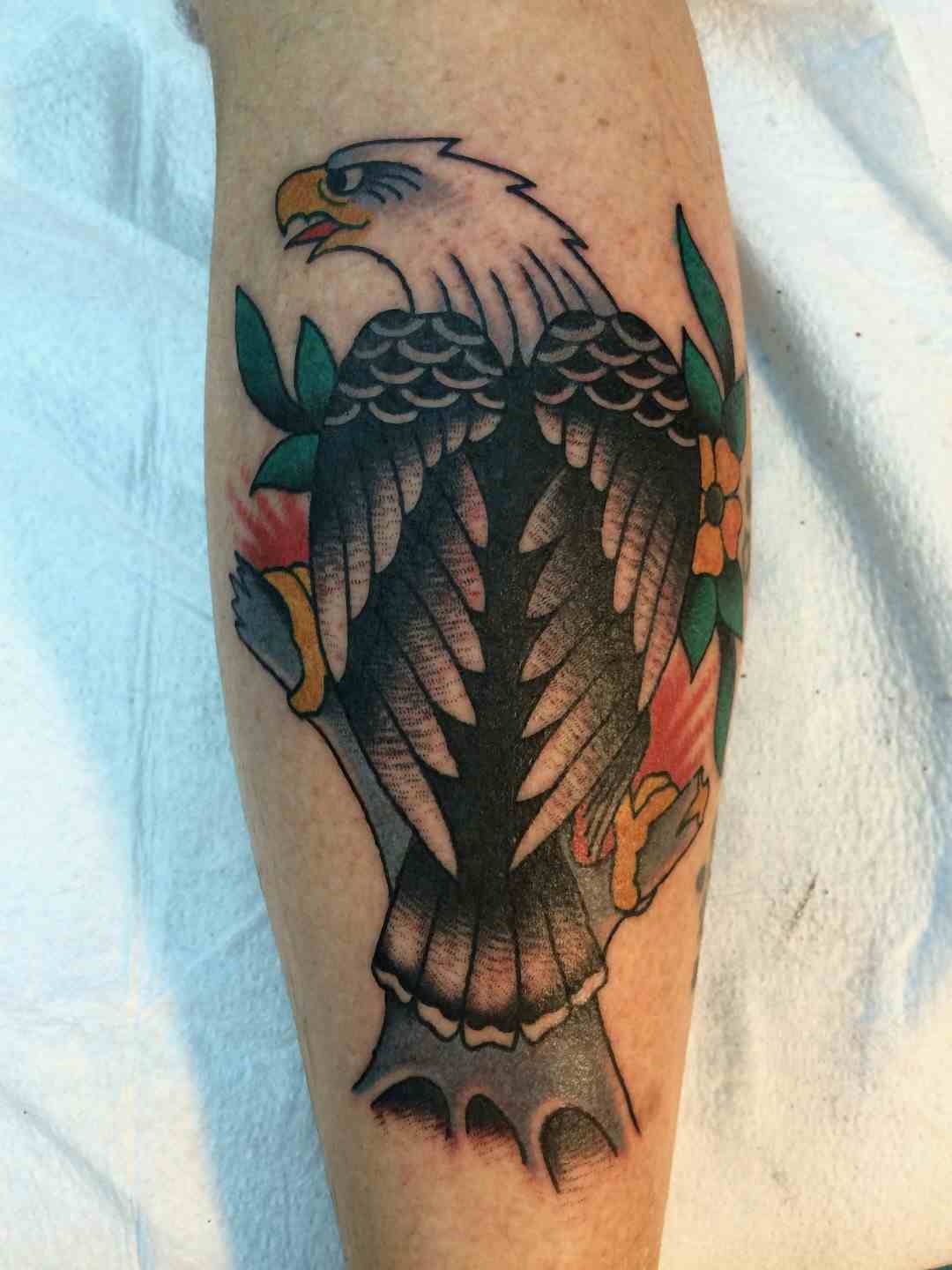 Bowling pin eagle tattoo