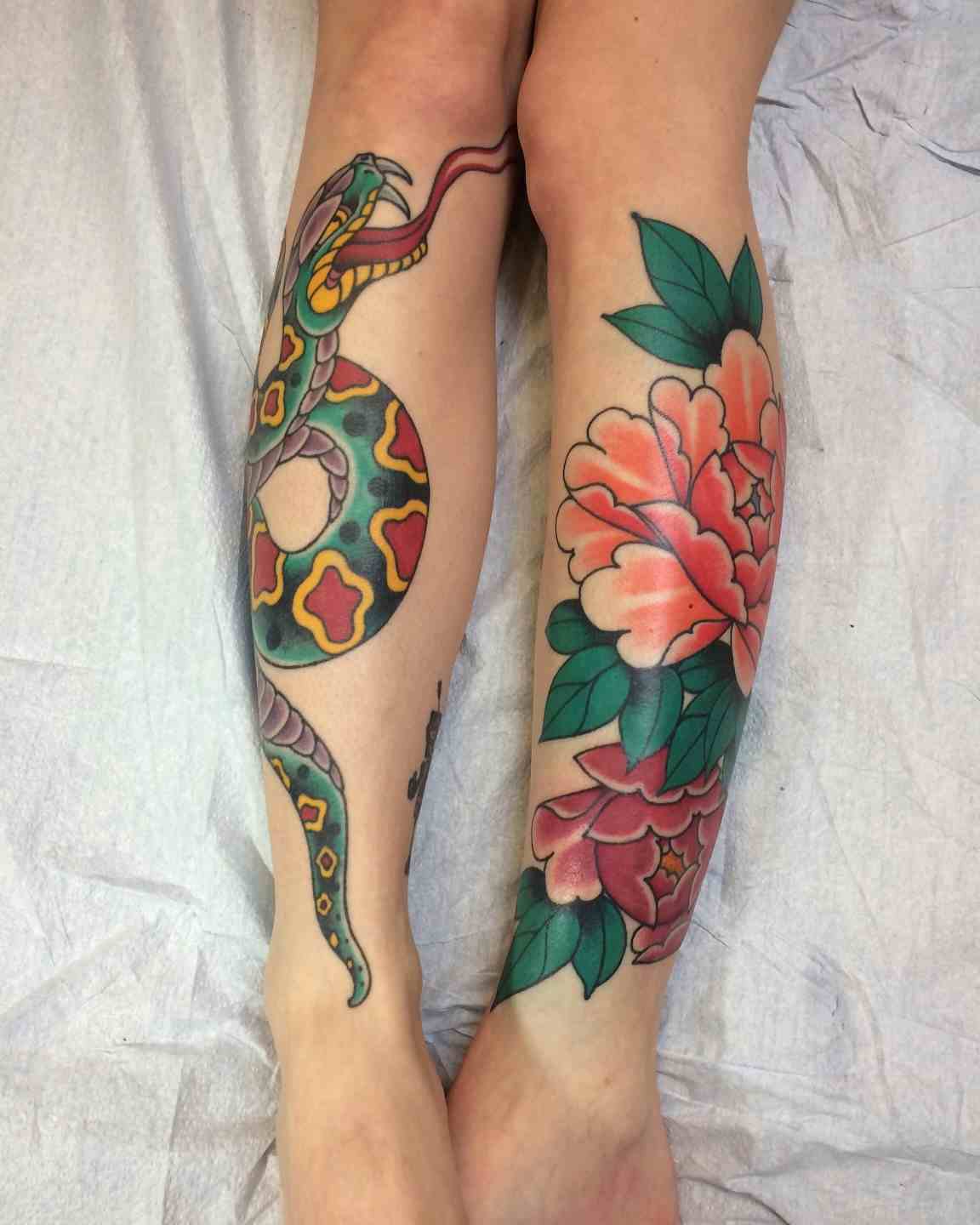 Snake and peony leg tattoos