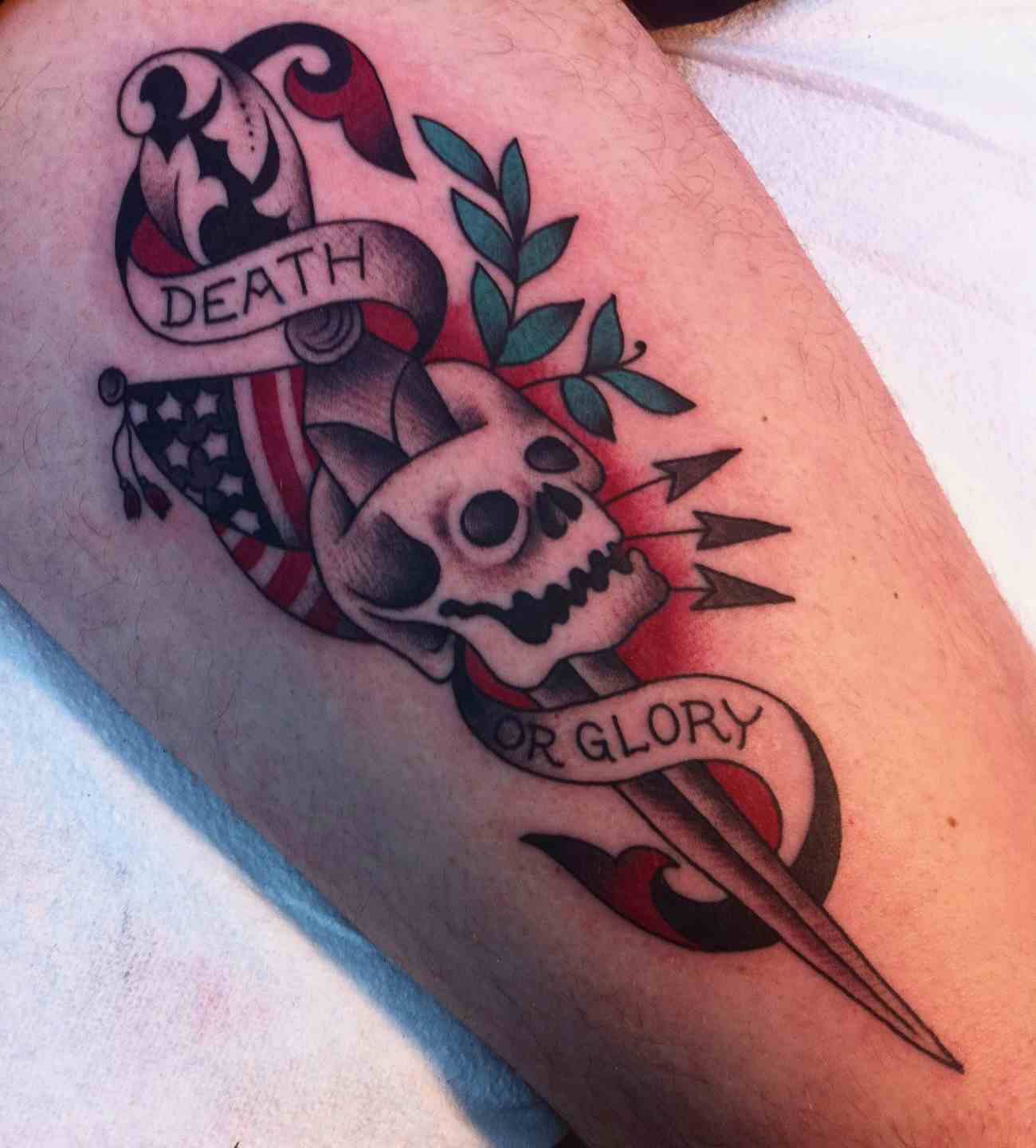 American traditional skull dagger tattoo