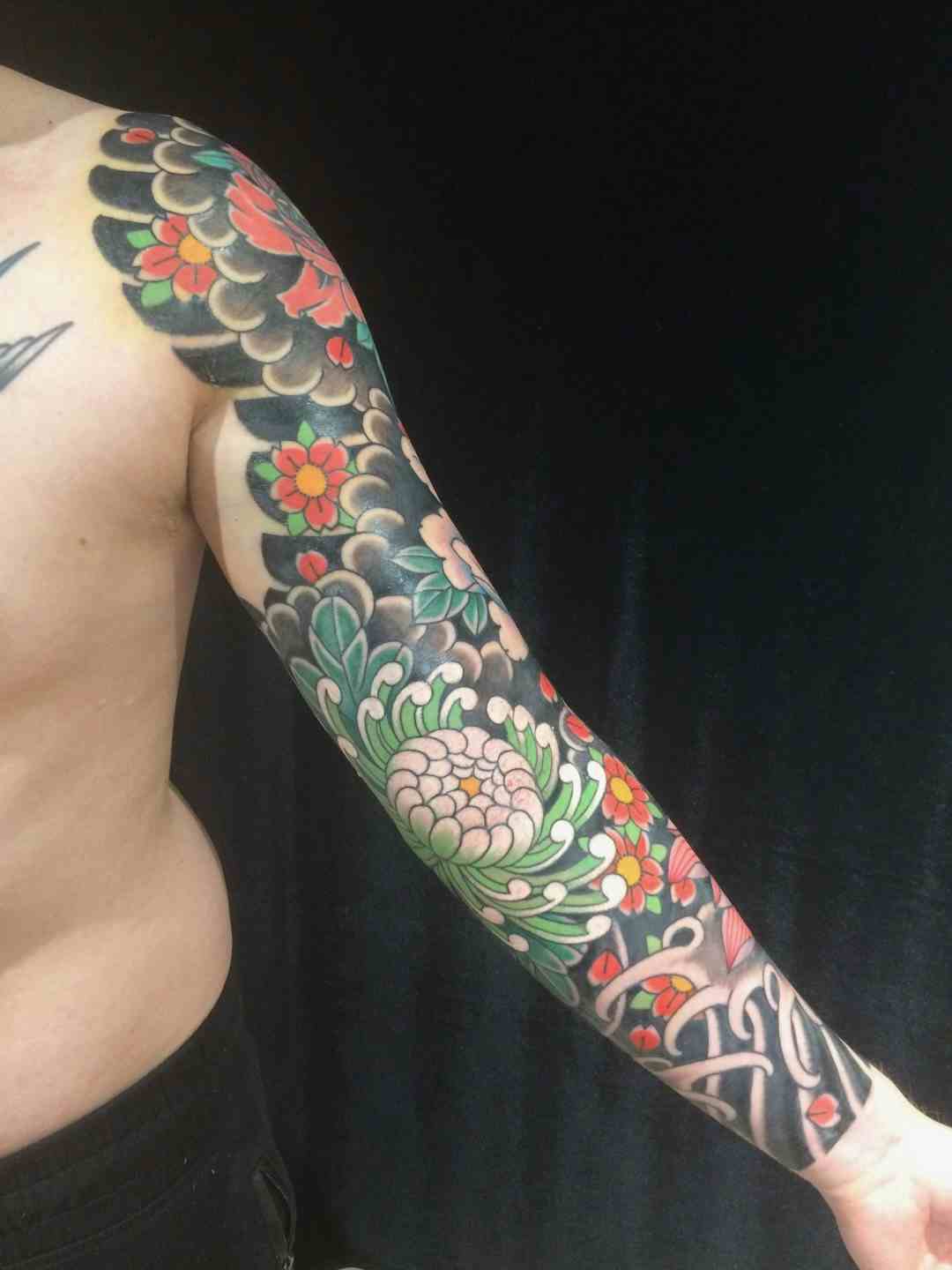 Japanese flower sleeve tattoo