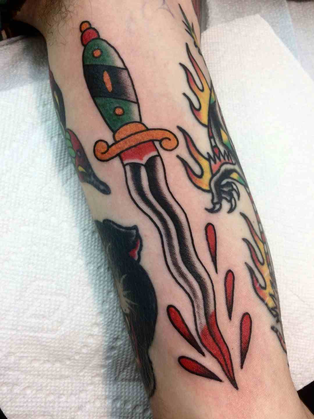 Dagger blood drop tattoo