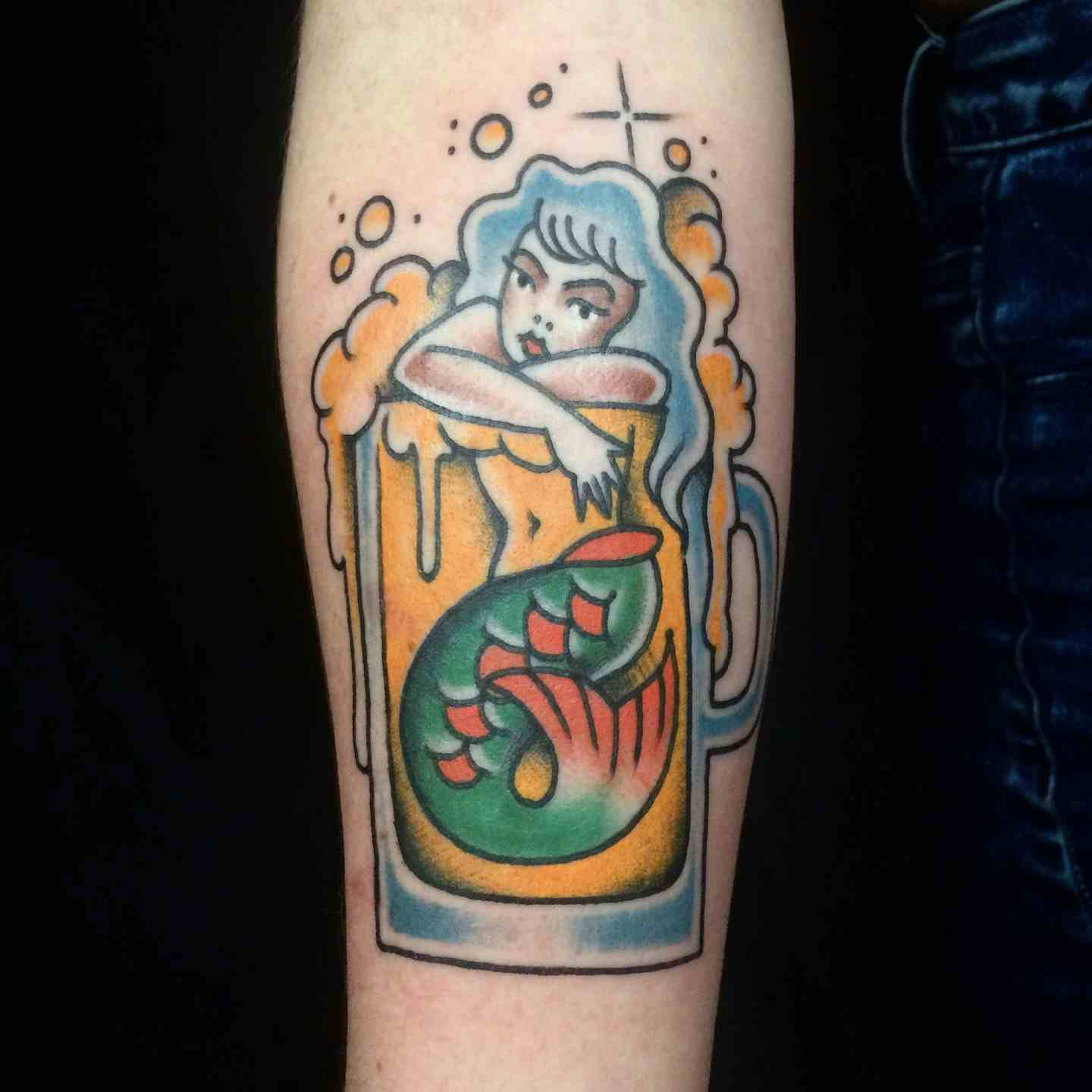 Mermaid in a beer glass tattoo