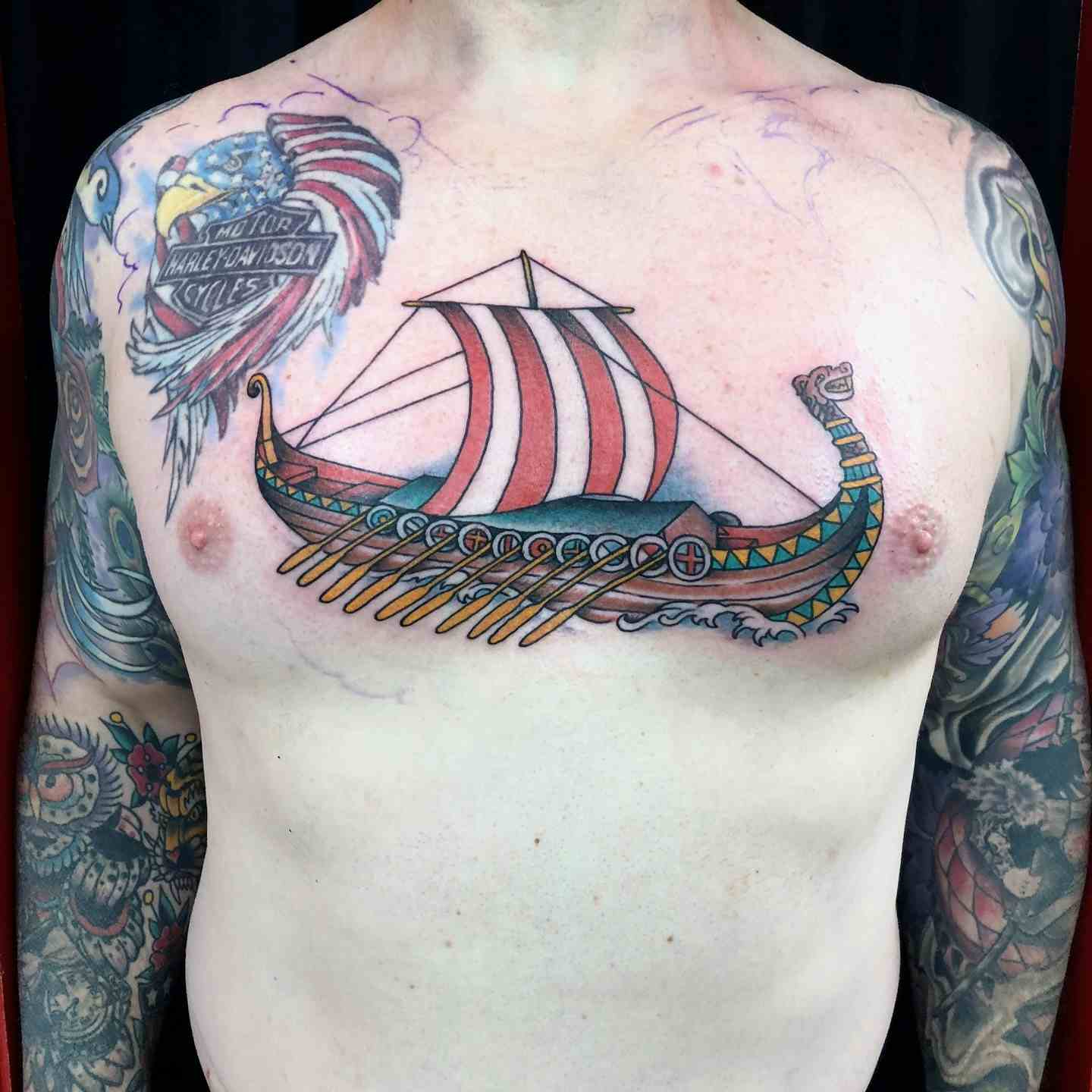 Viking ship chest tattoo