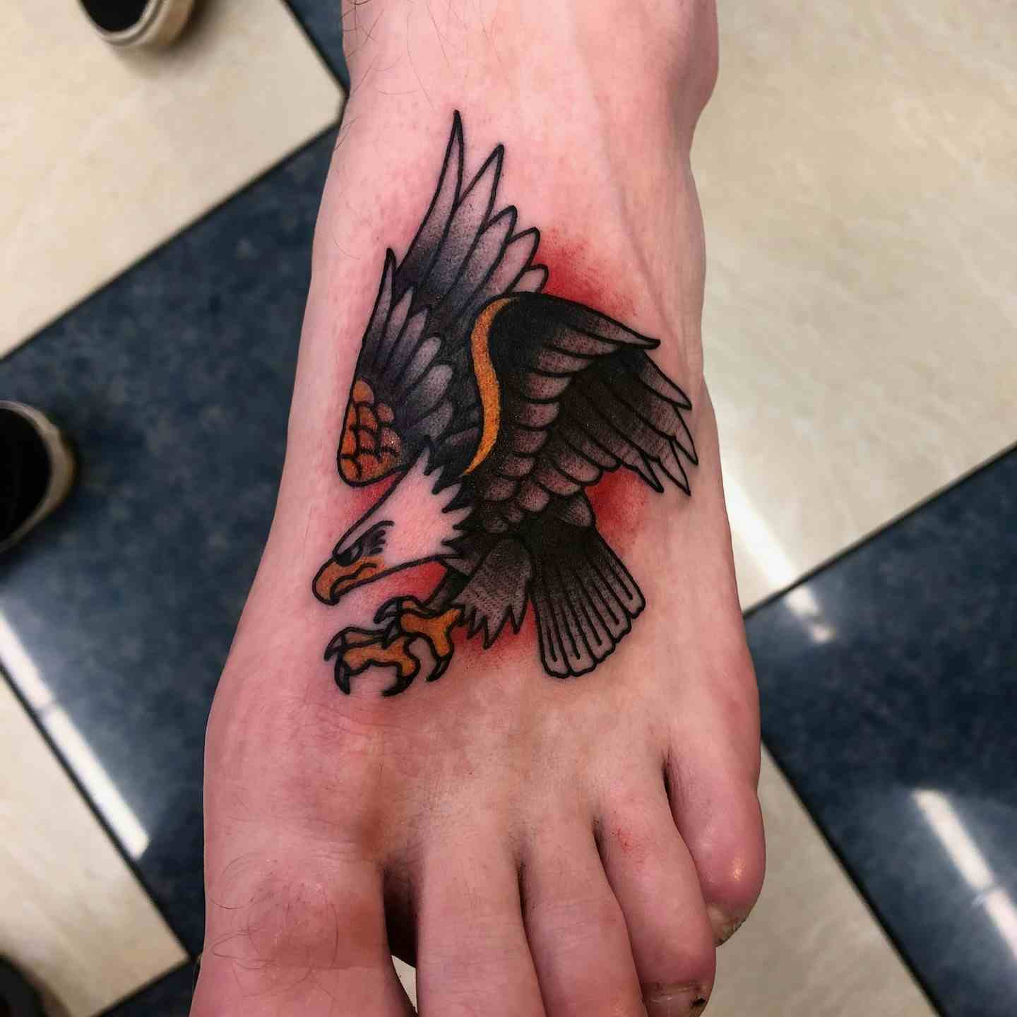 Eagle foot tattoo