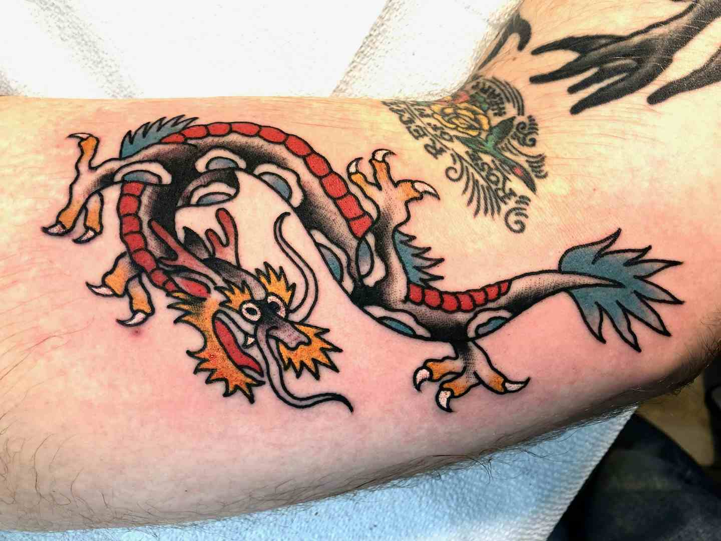 American traditional dragon tattoo
