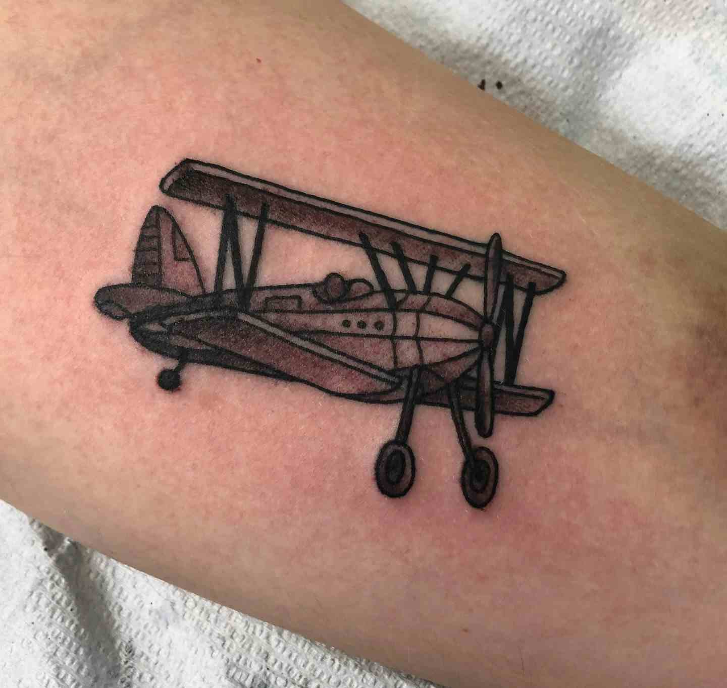 Biplane tattoo