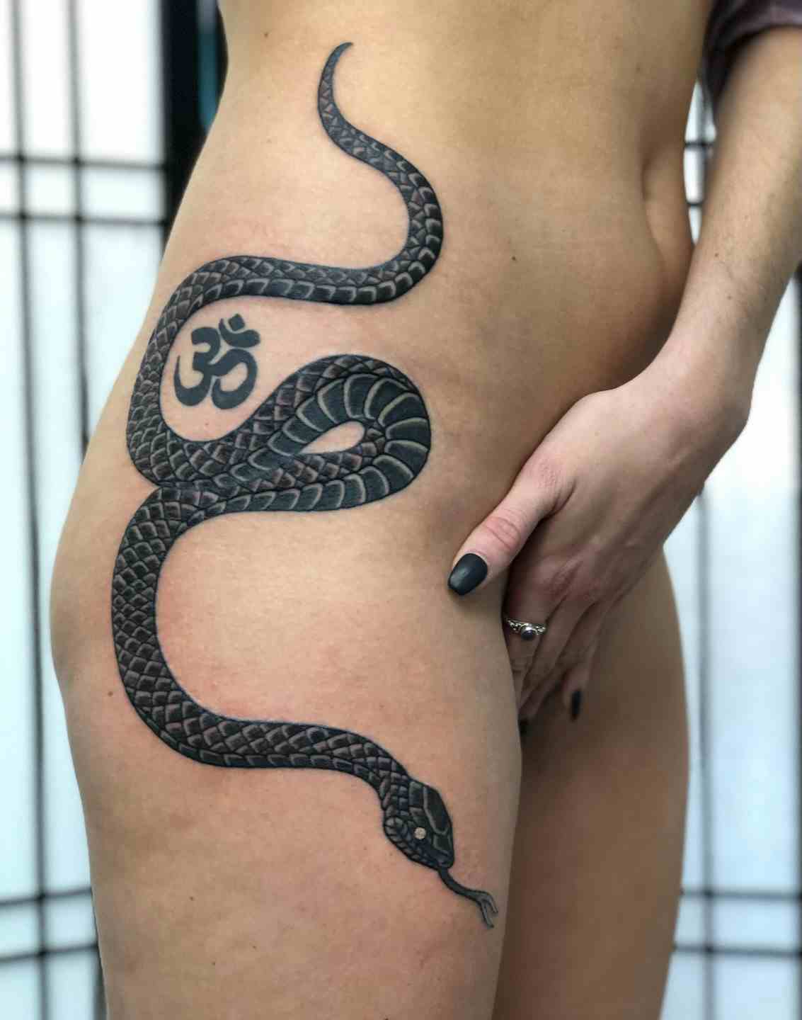 Japanese snake hip tattoo