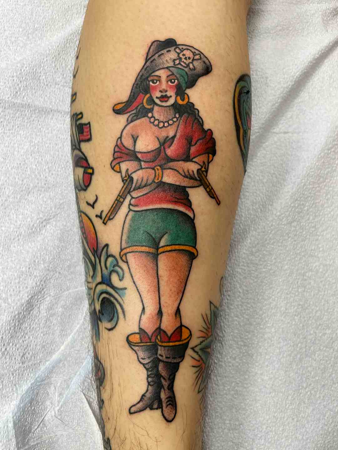 American traditional pirate pinup tattoo