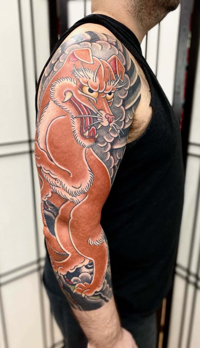 Japanese fox kitsune sleeve tattoo