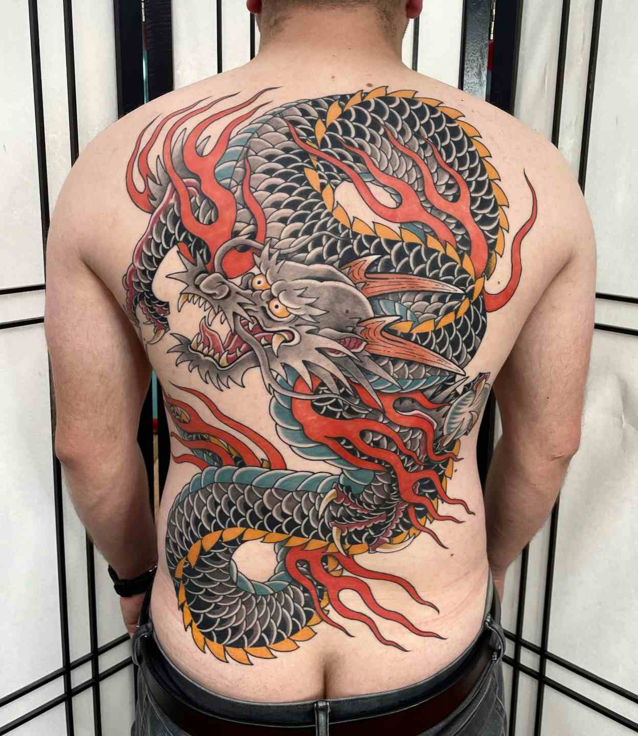 Japanese back piece black dragon tattoo