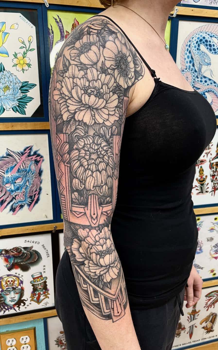 Art deco floral dot work sleeve tattoo
