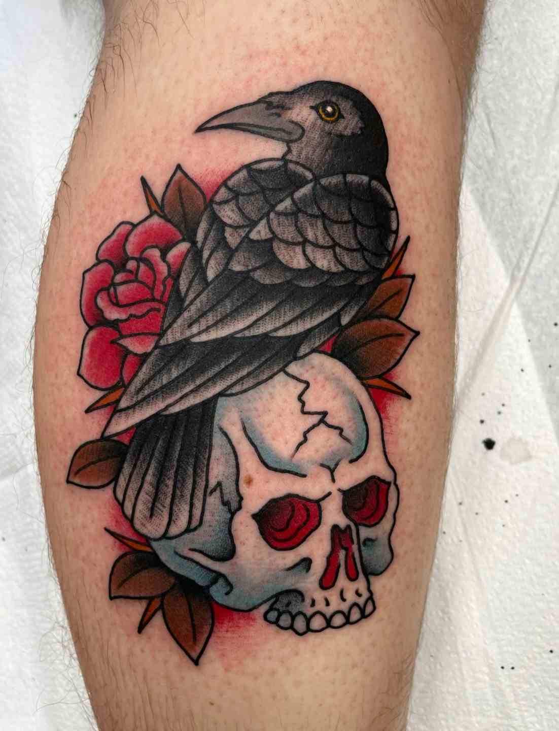 Traditional crow raven skull tattoo
