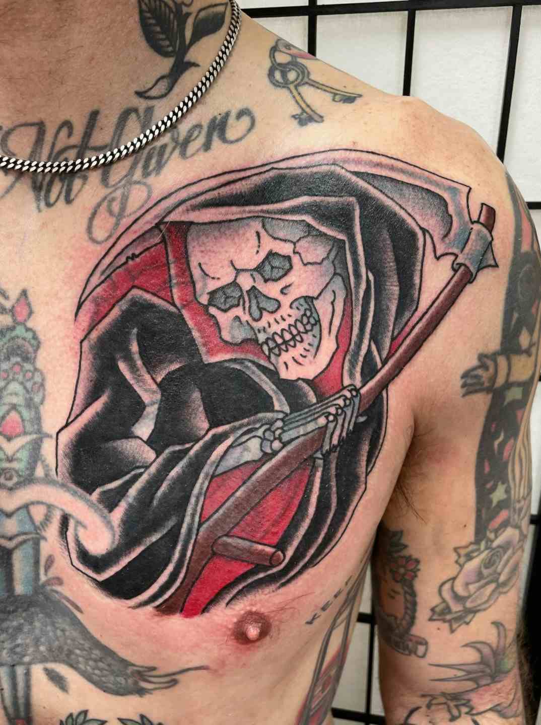 Grim reaper chest coverup tattoo