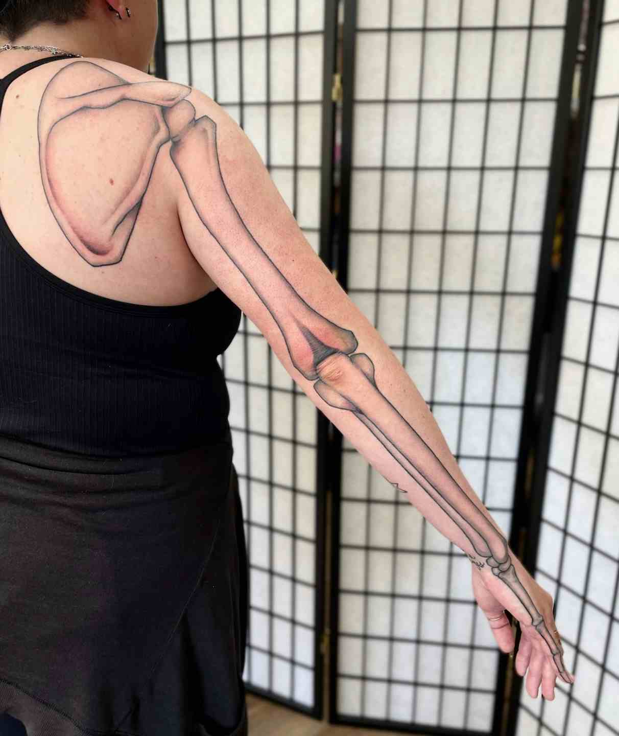 Anatomical skeleton arm black and gray tattoo