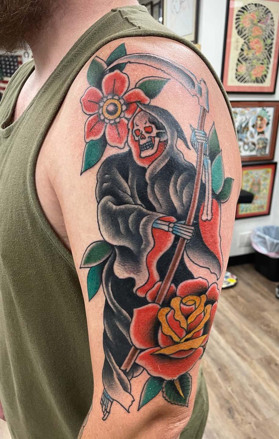 Traditional grim reaper rose tattoo