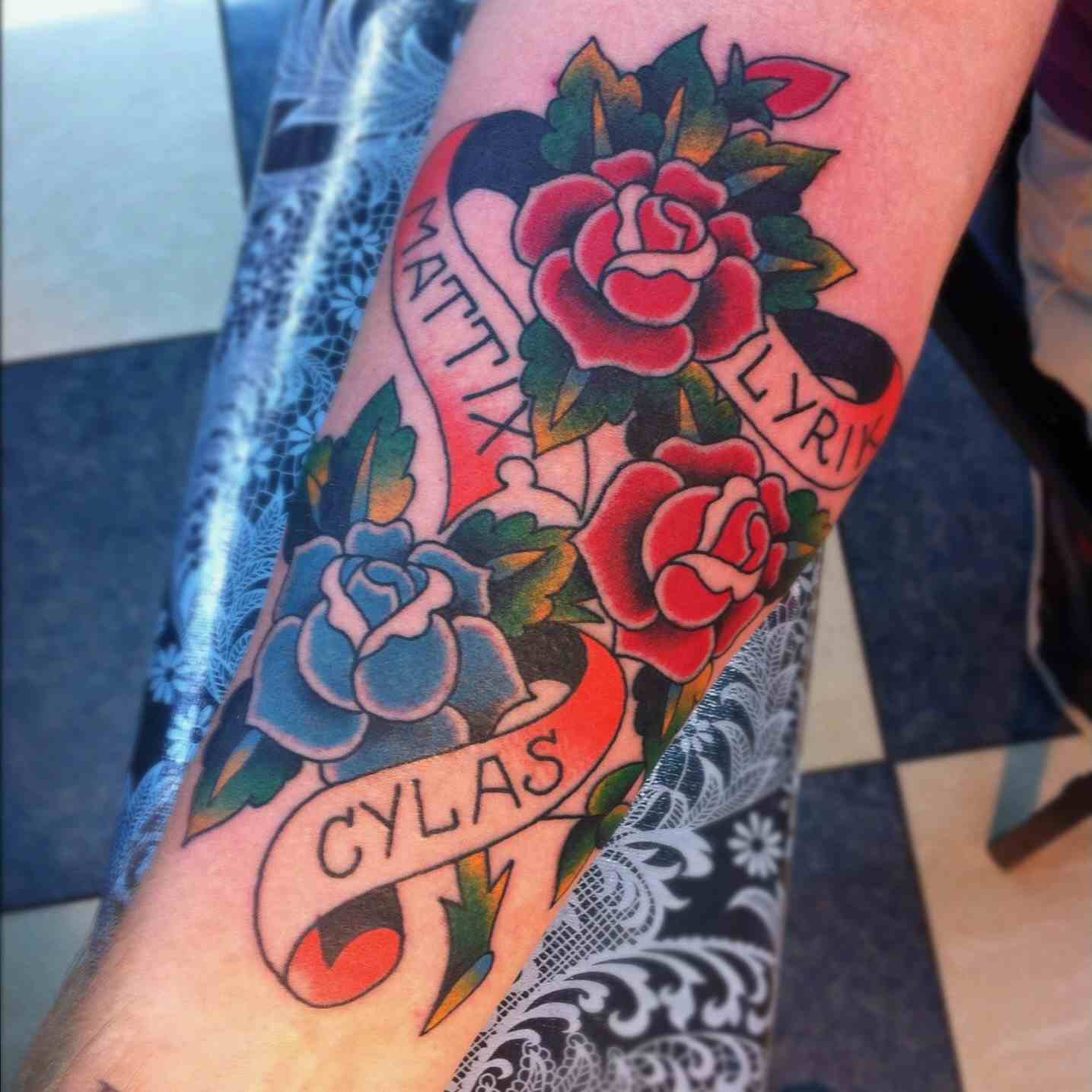 Flower banner tattoo