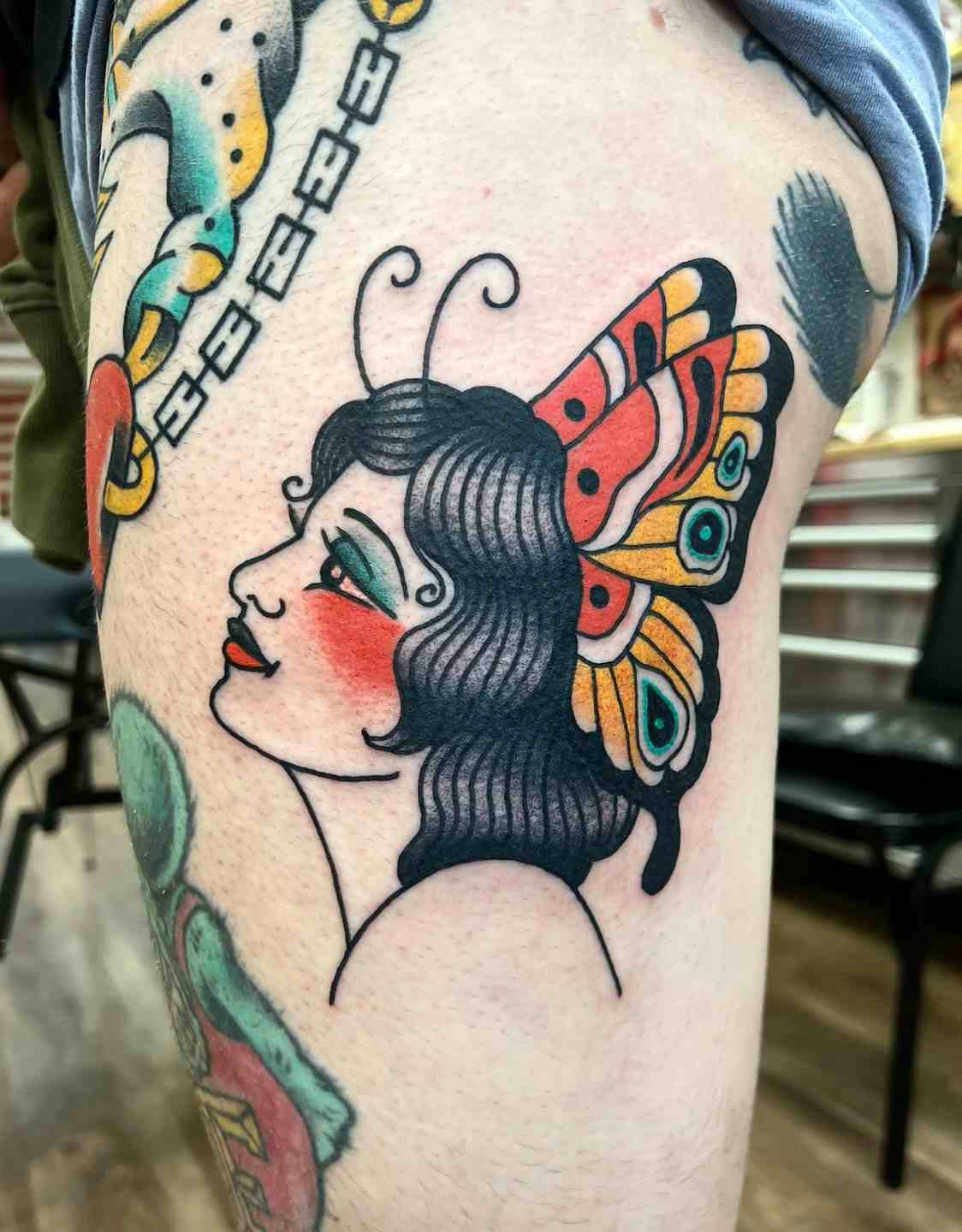 Butterfly girl head tattoo