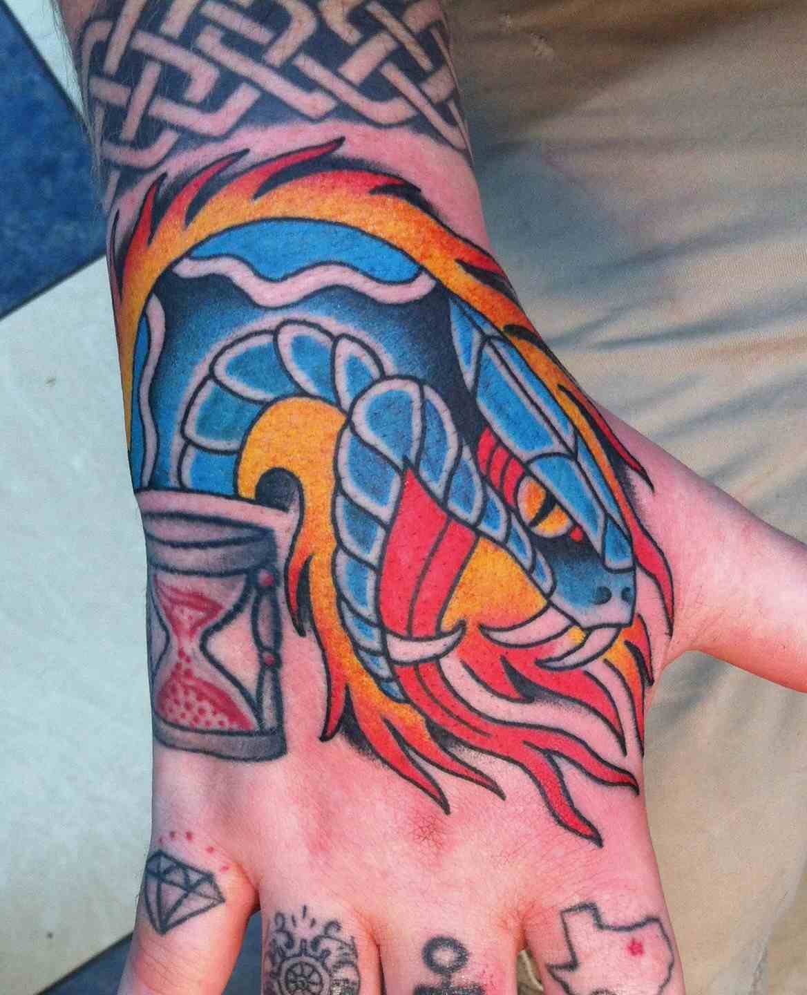 Snake flame tattoo
