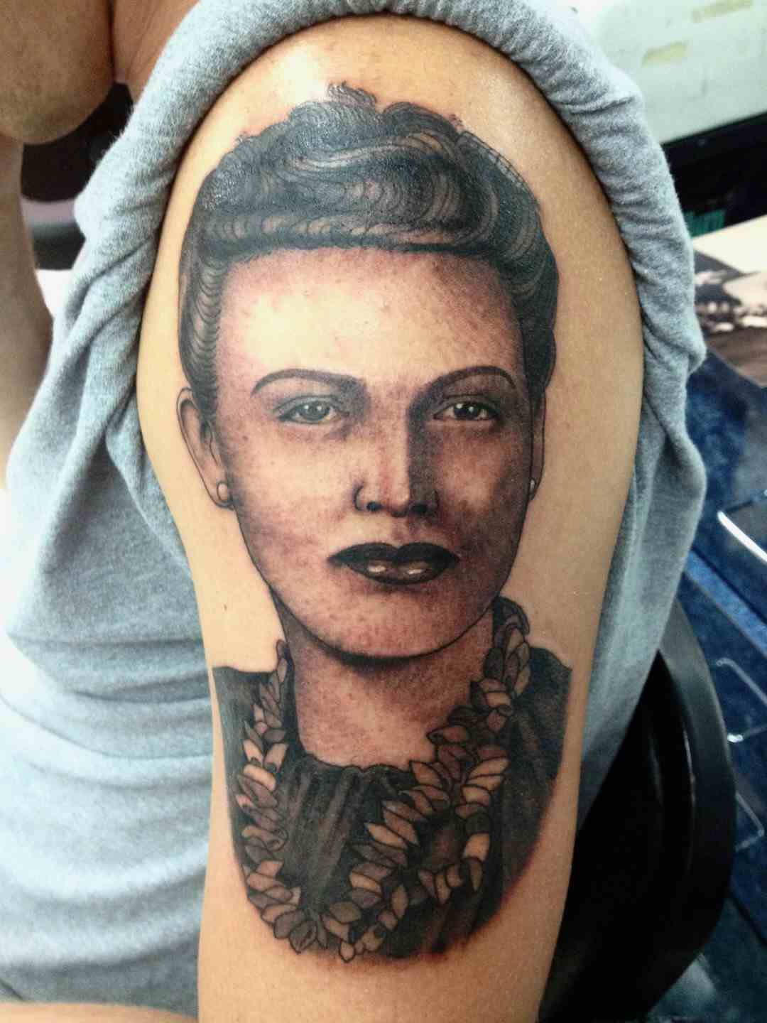 Female portrait tattoo