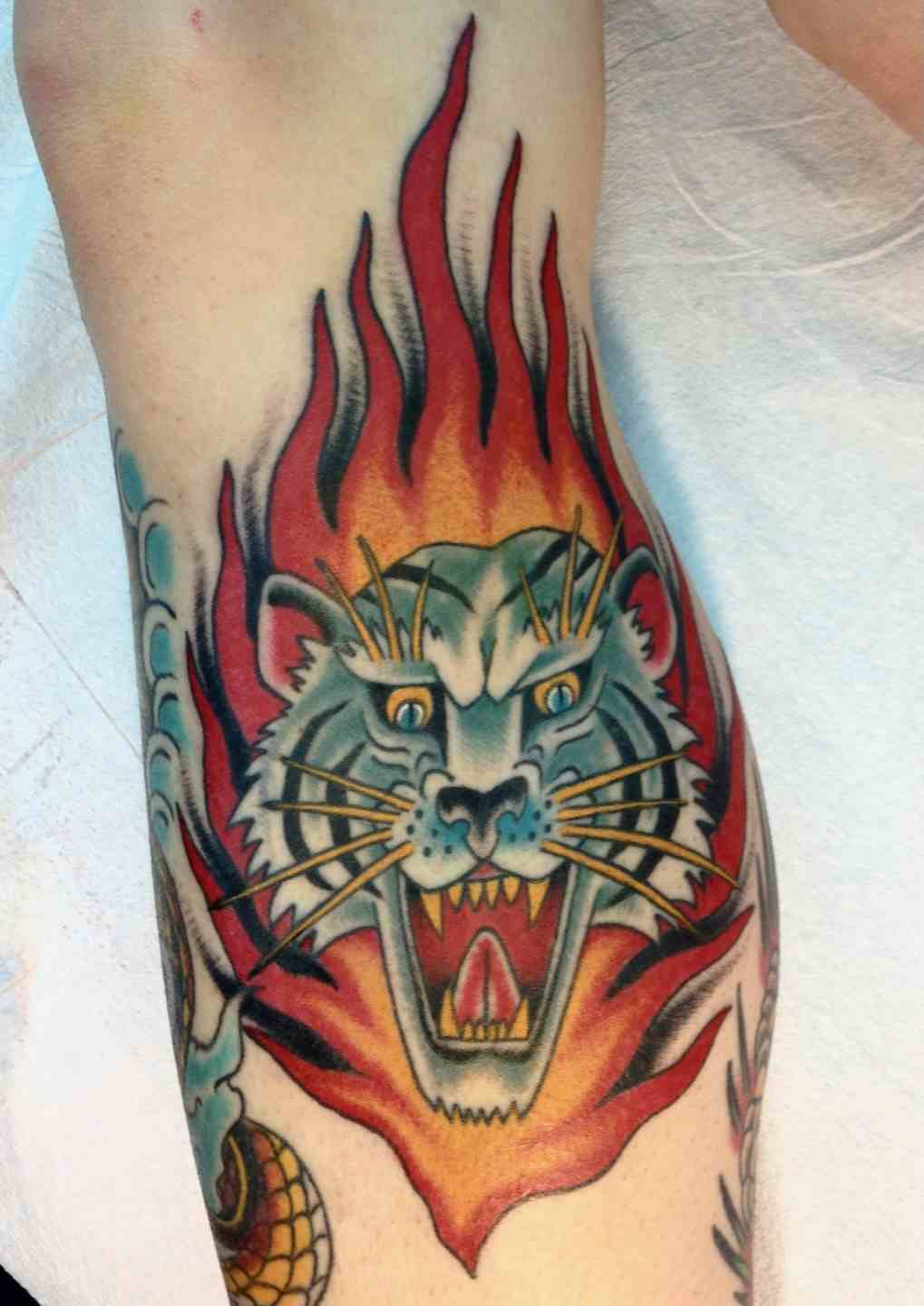 Tiger flame tattoo