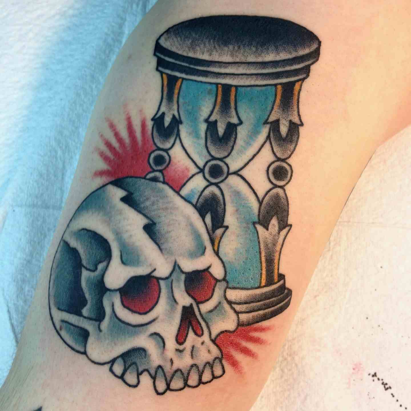 Skull hourglass tattoo