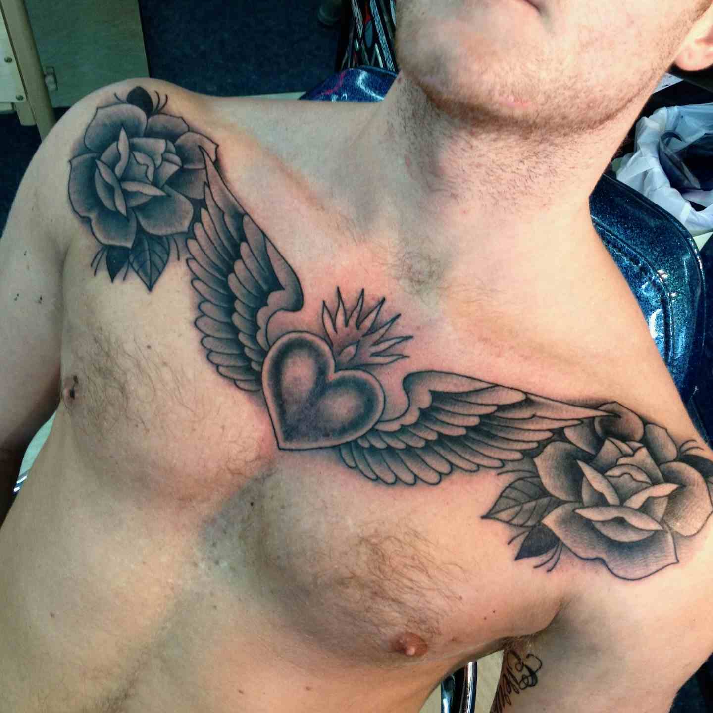 Winged heart roses tattoo