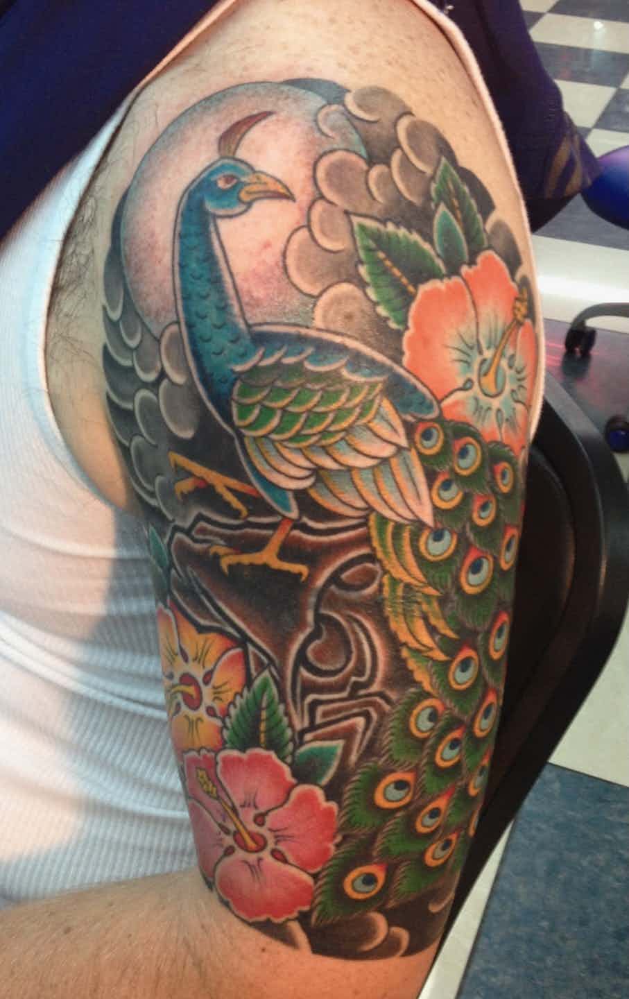 Peacock hibiscus tattoo