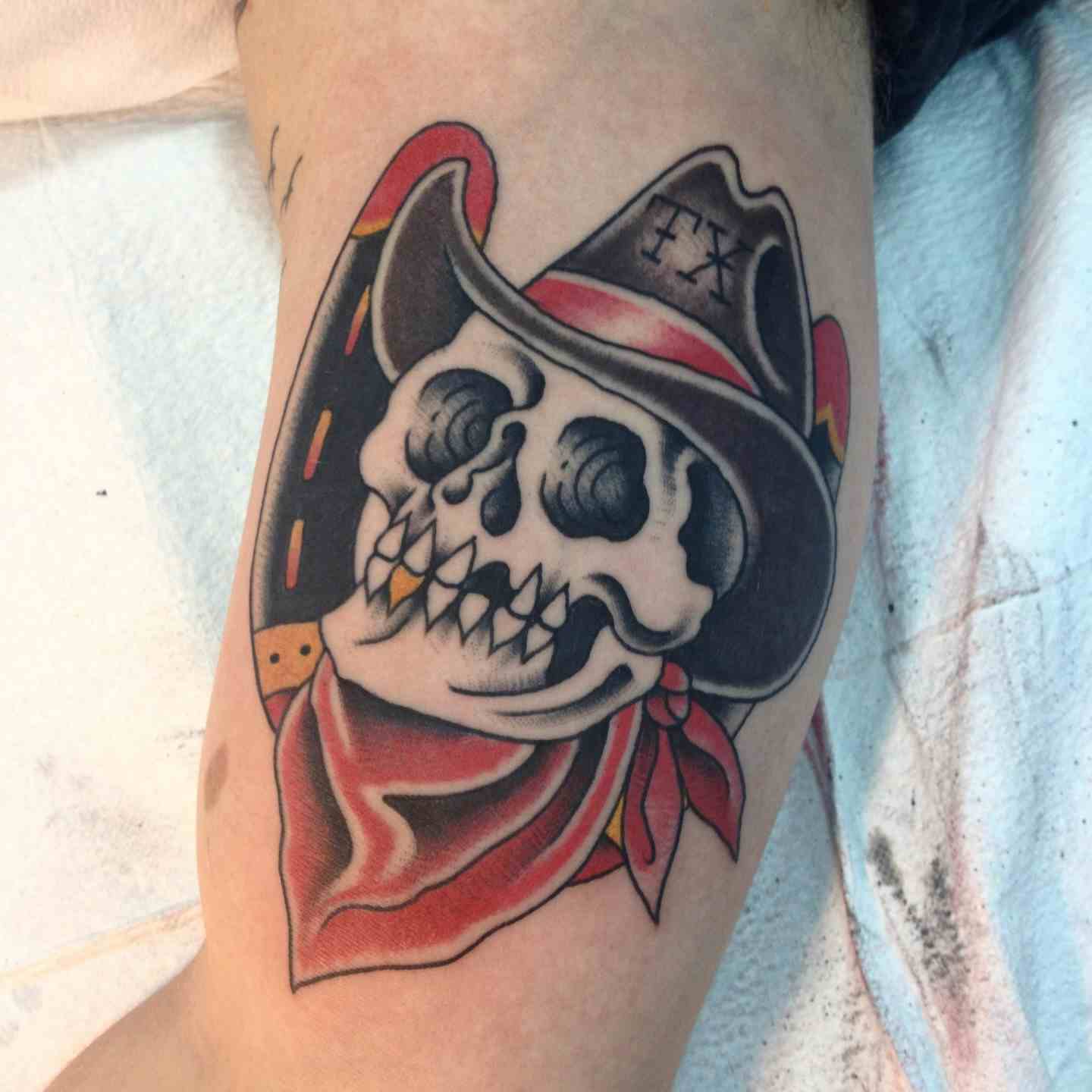 Outlaw skull tattoo