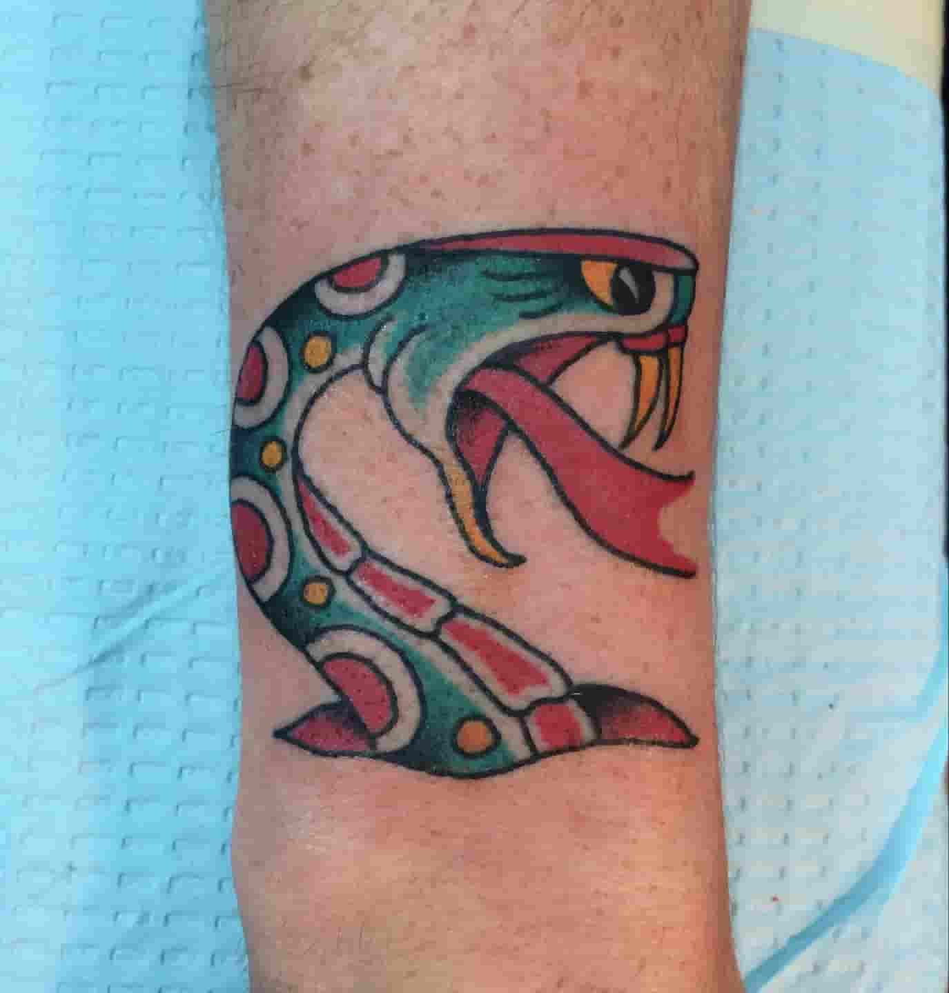 Snake head tattoo