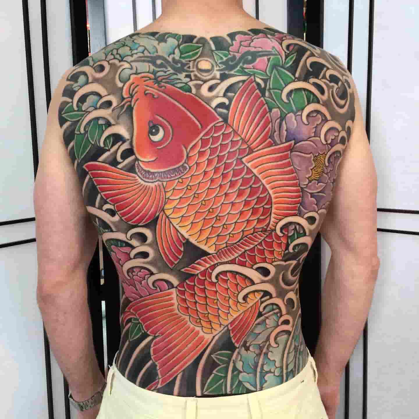 Japanese peony koi fish backpiece tattoo