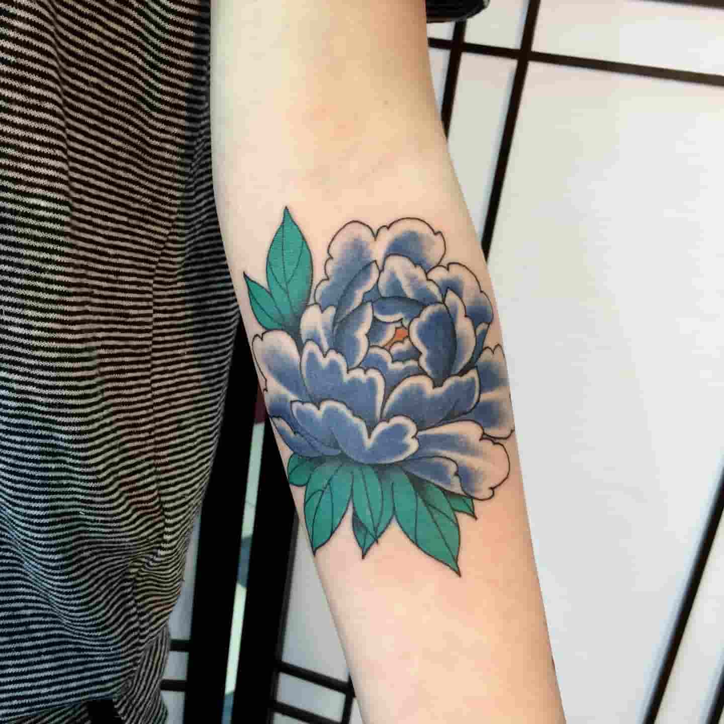 Peony forearm tattoo