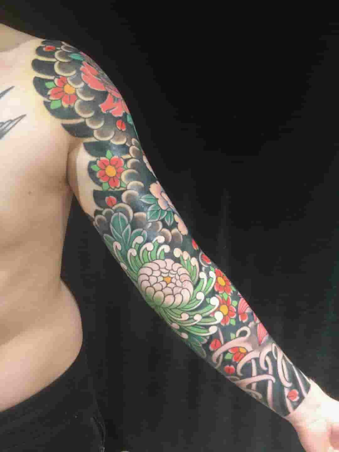 Japanese flower sleeve tattoo