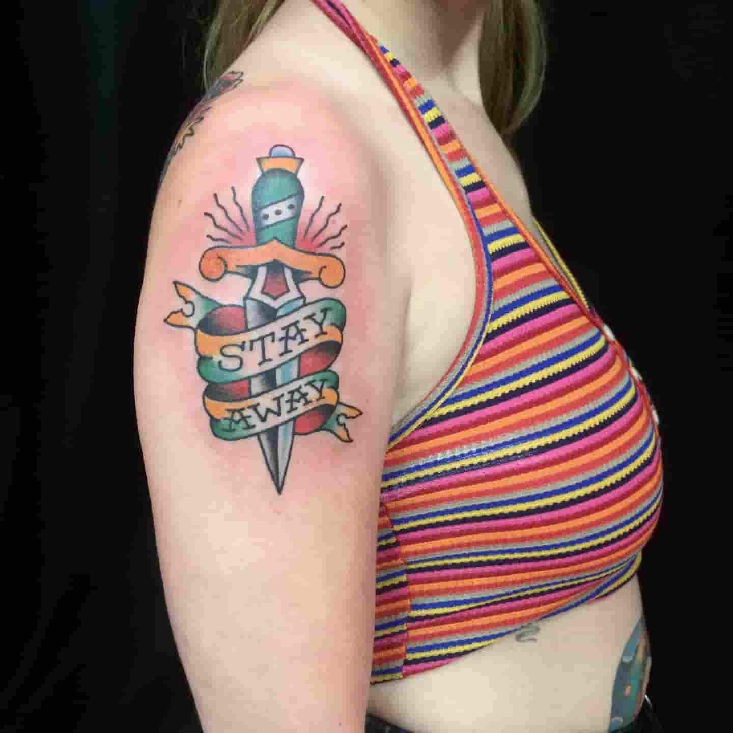 Banner dagger tattoo