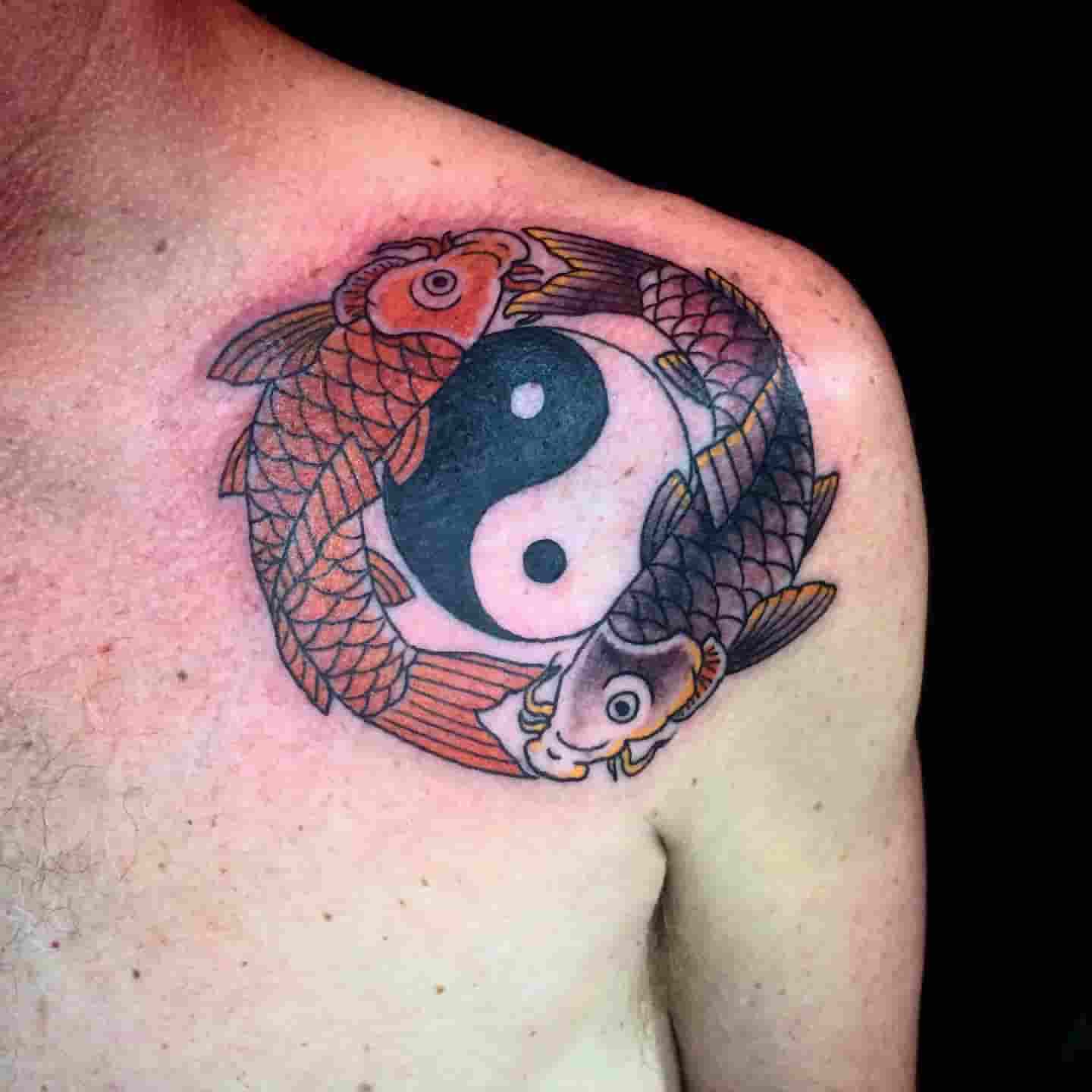 Koi fish yin yang tattoo