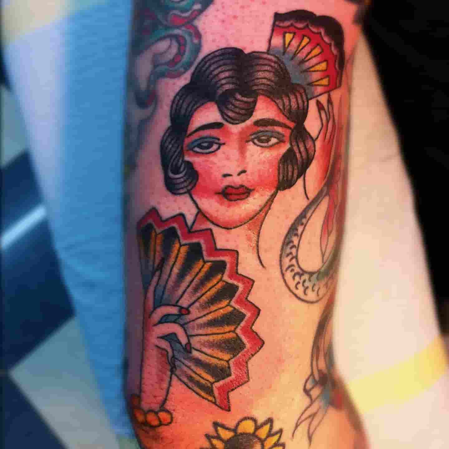 Spanish lady tattoo