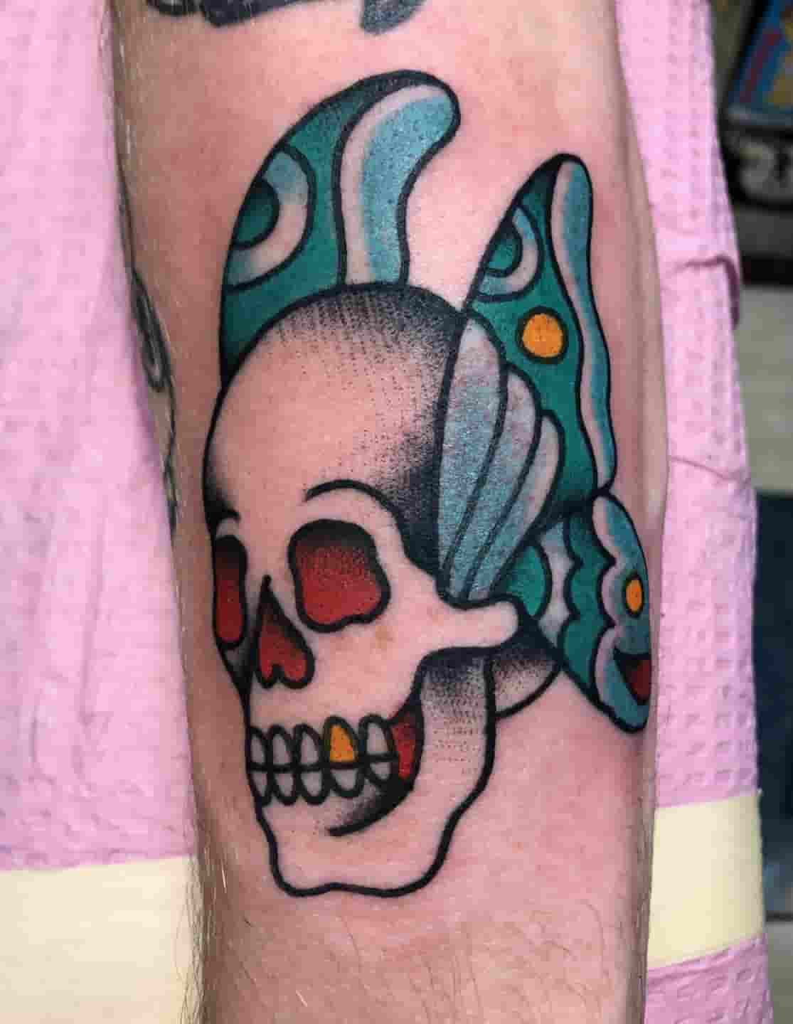 Butterfly skull tattoo