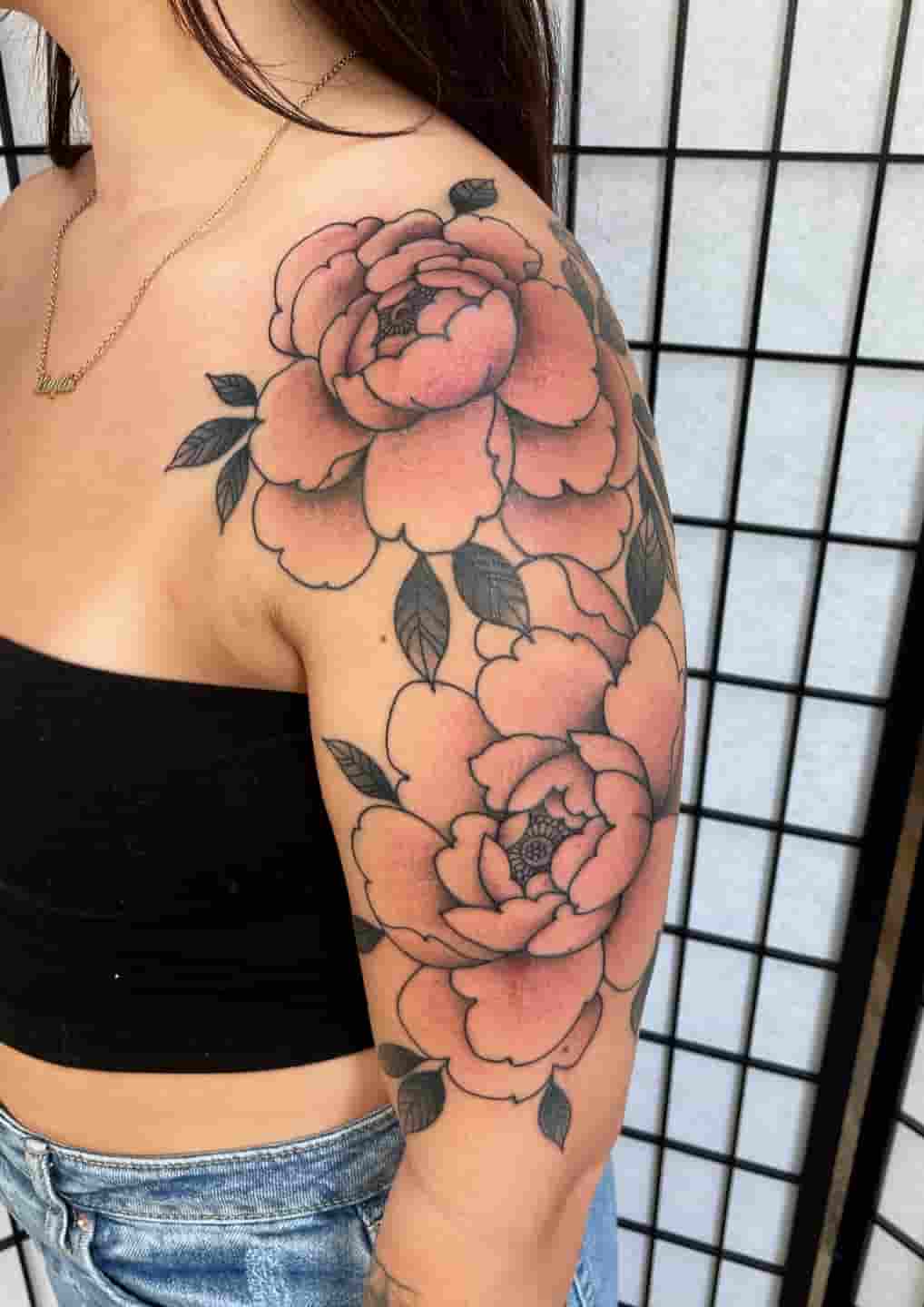 Black and gray minimalist peony tattoo