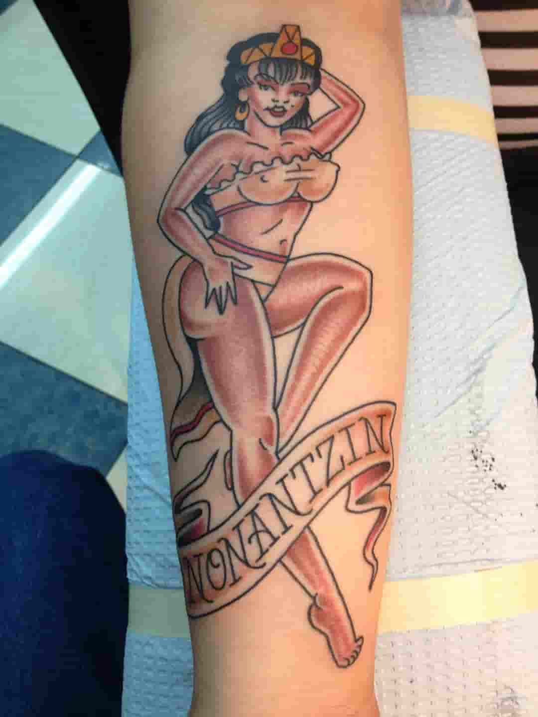 Aztec pinup tattoo